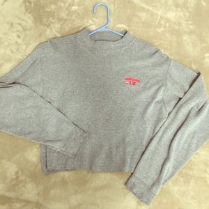 Cropped long sleeve top